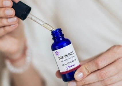 Ever Youthful anti aging serum in cobalt blue bottle